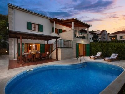 Villa Liza with pool at dusk